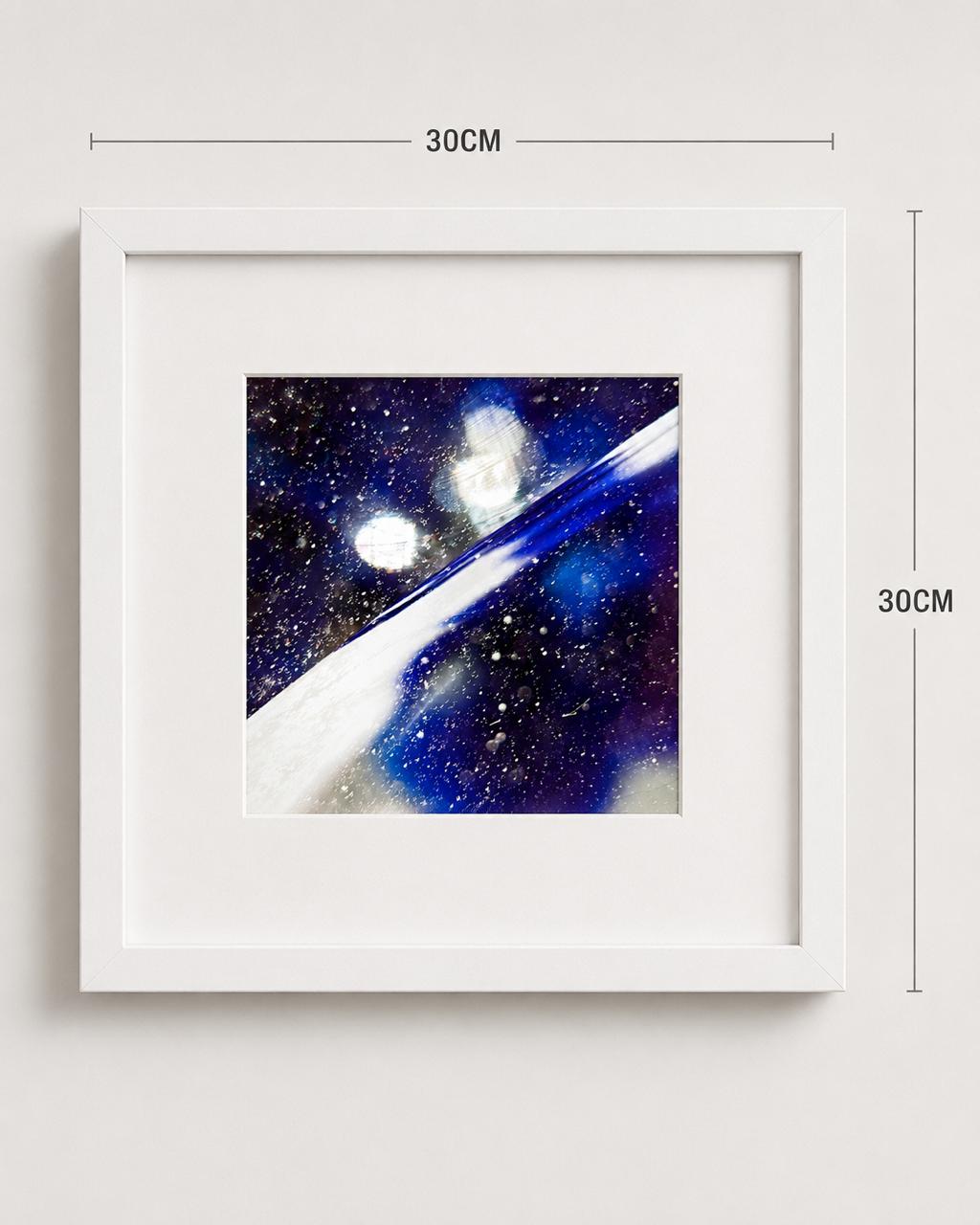 An artwork from Miranda Rumina’s poetry book in a white frame measuring 30 × 30 cm